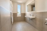 Bad - Penthouse über den Dächern von Lustenau. 63 m² Wohnraum. 72 m² Dachterrasse.